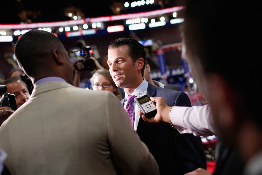 Donald Trump Jr. is interviewed by the media prior to the start of the second day of the Republican National Convention on July 19, 2016 at the Quicken Loans Arena in Cleveland, Ohio. (Photo by Win McNamee/Getty)