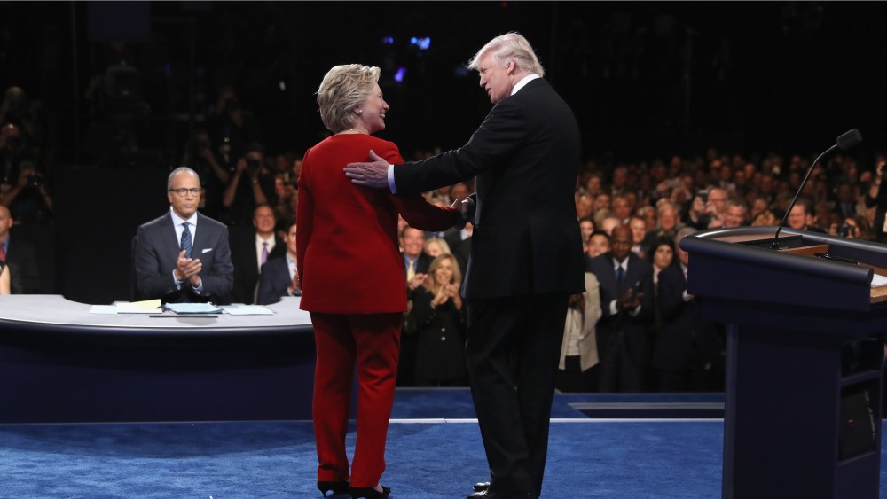 Democratic presidential nominee Hillary Clinton shakes hands with Republican presidential nominee Donald Trump during the Presidential Debate at Hofstra University on Sept. 26, 2016 in Hempstead, N.Y. (Photo by Joe Raedle/Getty)