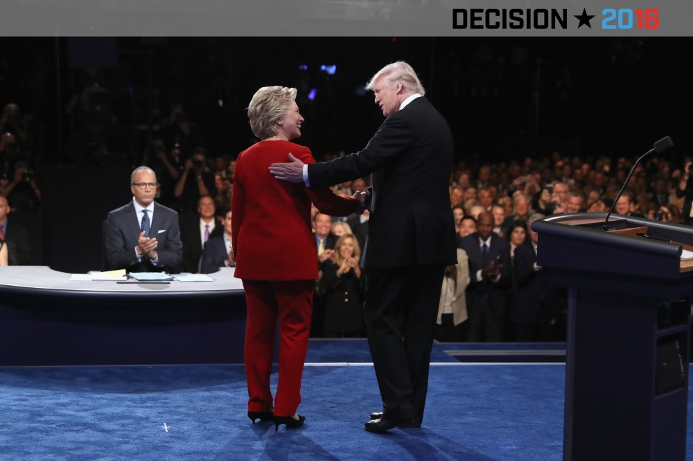 Democratic presidential nominee Hillary Clinton shakes hands with Republican presidential nominee Donald Trump during the Presidential Debate at Hofstra University on Sept. 26, 2016 in Hempstead, N.Y. (Photo by Joe Raedle/Getty)