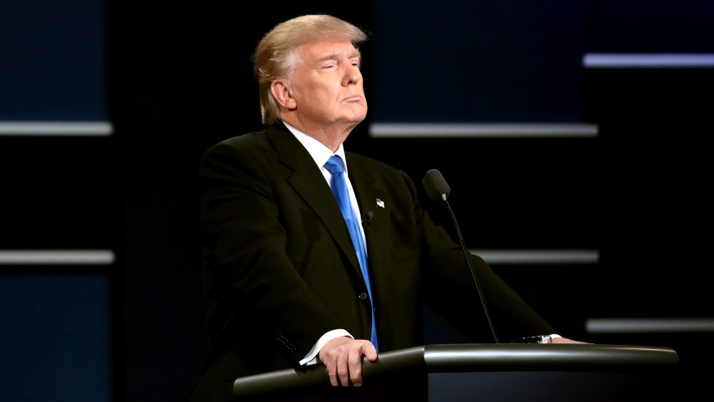 Republican presidential nominee Donald Trump looks on during the Presidential Debate at Hofstra University on Sept. 26, 2016 in Hempstead, N.Y. (Photo by Drew Angerer/Getty)