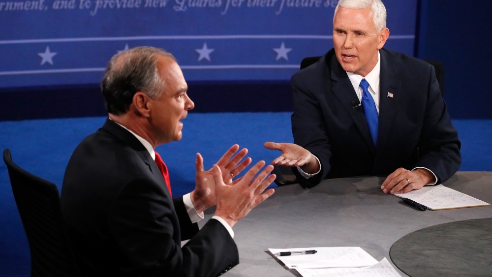 Democratic vice presidential nominee Tim Kaine  and Republican vice presidential nominee Mike Pence speak during the Vice Presidential Debate at Longwood University on Oct. 4, 2016 in Farmville, Va. (Photo by Andrew Gombert/Pool/Getty)