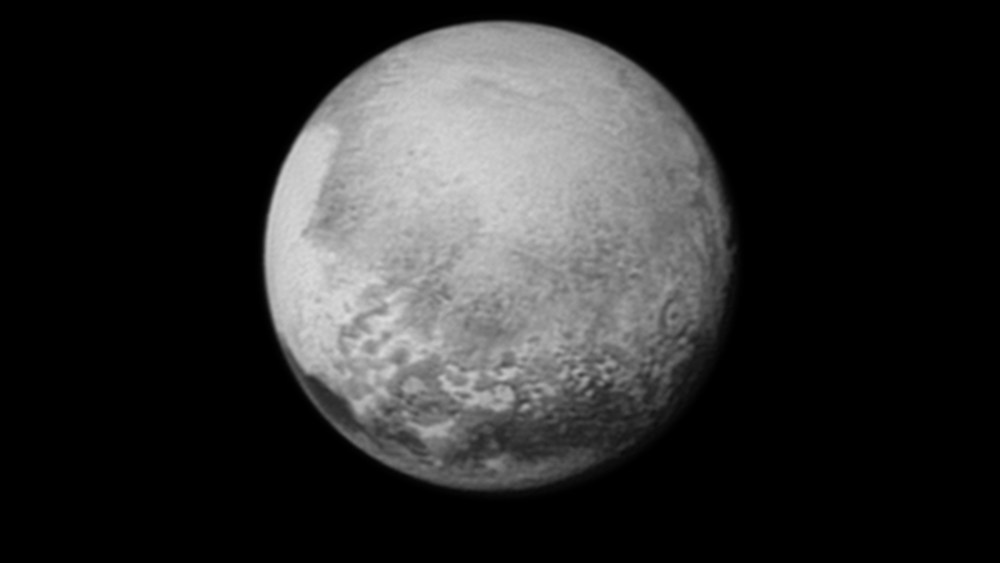 Pluto’s bright, mysterious “heart” is rotating into view, ready for its close-up on close approach, in this image taken by New Horizons on July 12 from a distance of 1.6 million miles (2.5 million kilometers).