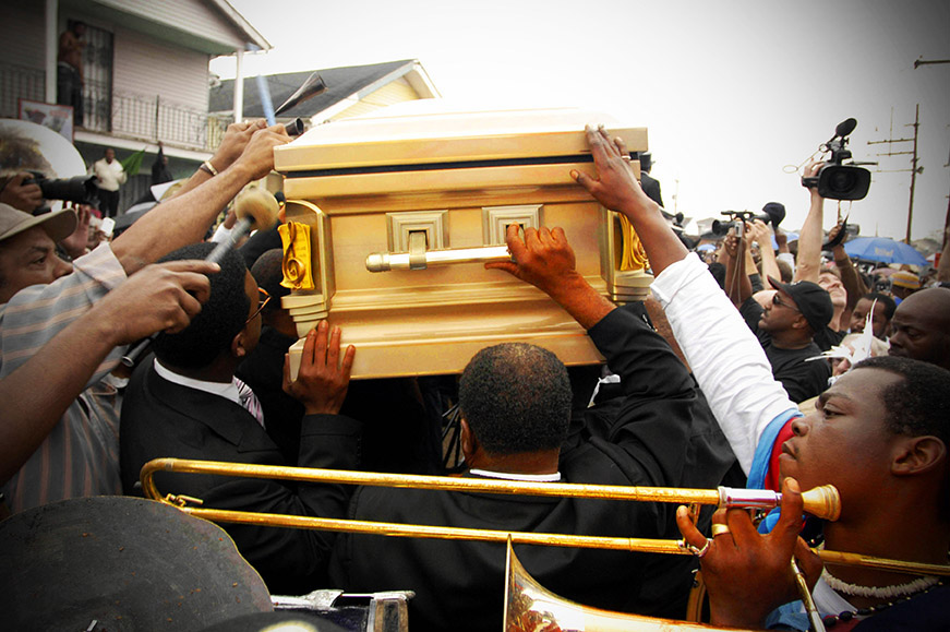 Mourners carry the casket of Dinerral Shavers, 25, who died from a gunshot to the back of his head in New Orleans, Sat., Jan. 6, 2007. Shavers was the snare drummer for the Hot 8 Brass Band and the music teacher at L.E. Rabouin High School, where he...