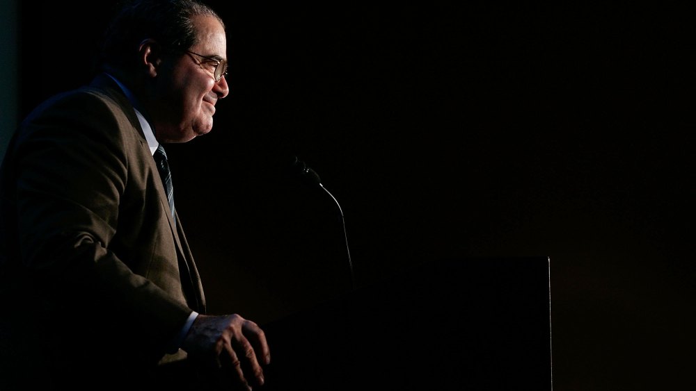 Late Supreme Court Associate Justice Antonin Scalia smiles as he addresses a Northern Virginia Technology Council (NVTC) breakfast Dec. 13, 2006 in McLean, Va. (Photo by Alex Wong/Getty)