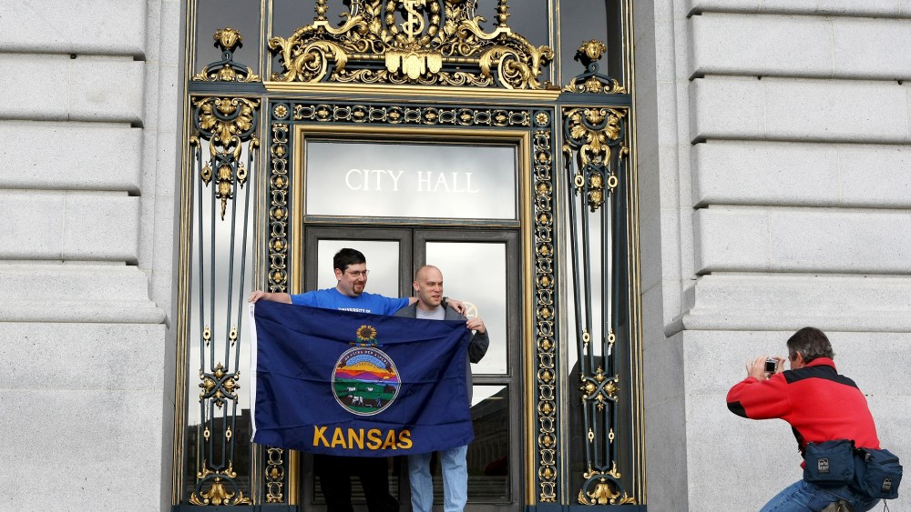 Same-sex couple David Greenbaum and Mike Silverman of Kansas have their picture taken before being married at San Francisco City.