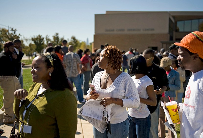Early voters line up outside of the Sugar Creek branch library on North Tryon Street on October 31, 2008 in Charlotte, North Carolina.  (Photo by Davis Turner/Getty Images)