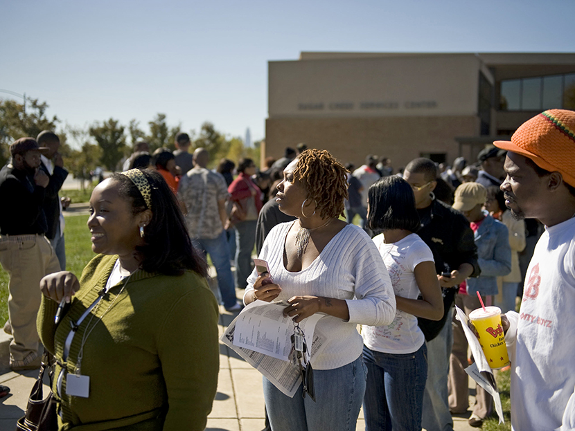 Early voters line up outside of the Sugar Creek branch library on North Tryon Street on October 31, 2008 in Charlotte, North Carolina. (Photo by Davis Turner/Getty Images)