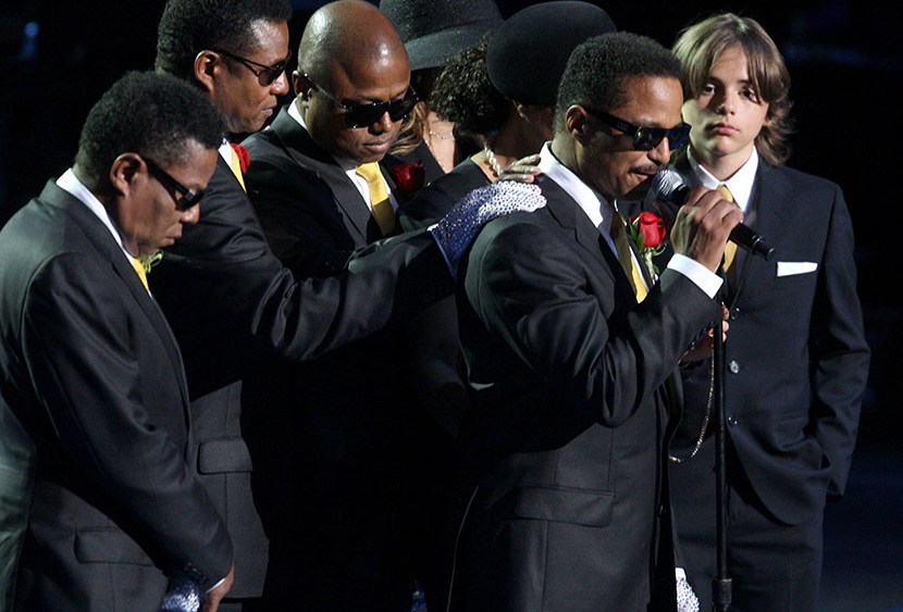 (L-R) Tito Jackson, Jermaine Jackson, Randy Jackson, La Toya Jackson, Janet Jackson and Michael Jackson's son Prince Michael Jackson look on as Marlon Jackson (2nd R) speaks during the Michael Jackson public memorial service held at Staples Center on...