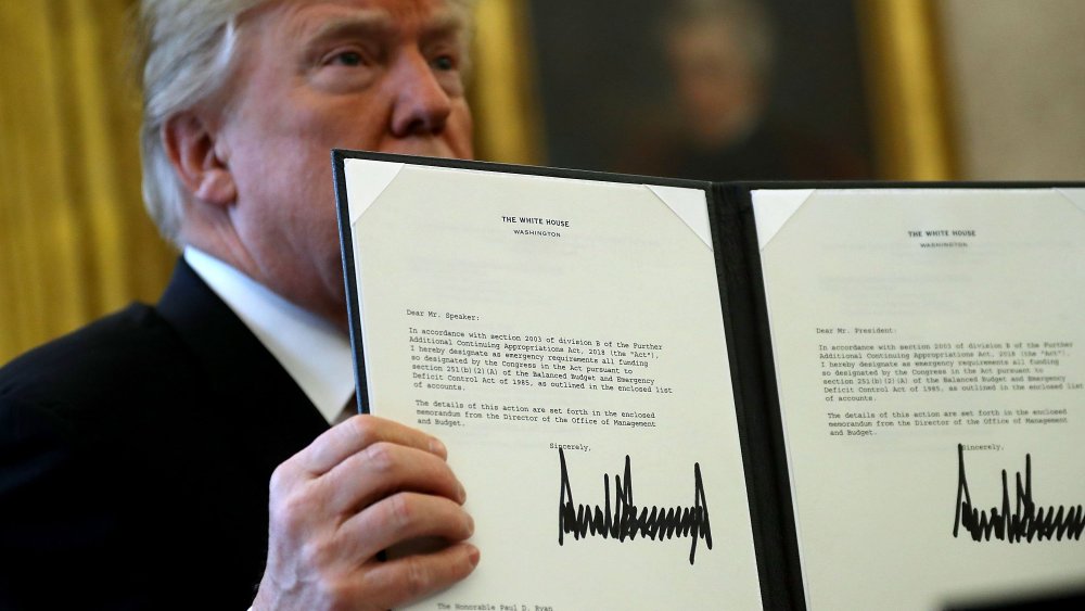 Image: Donald Trump Signs Tax Reform And Jobs Bill Into Law At The White House