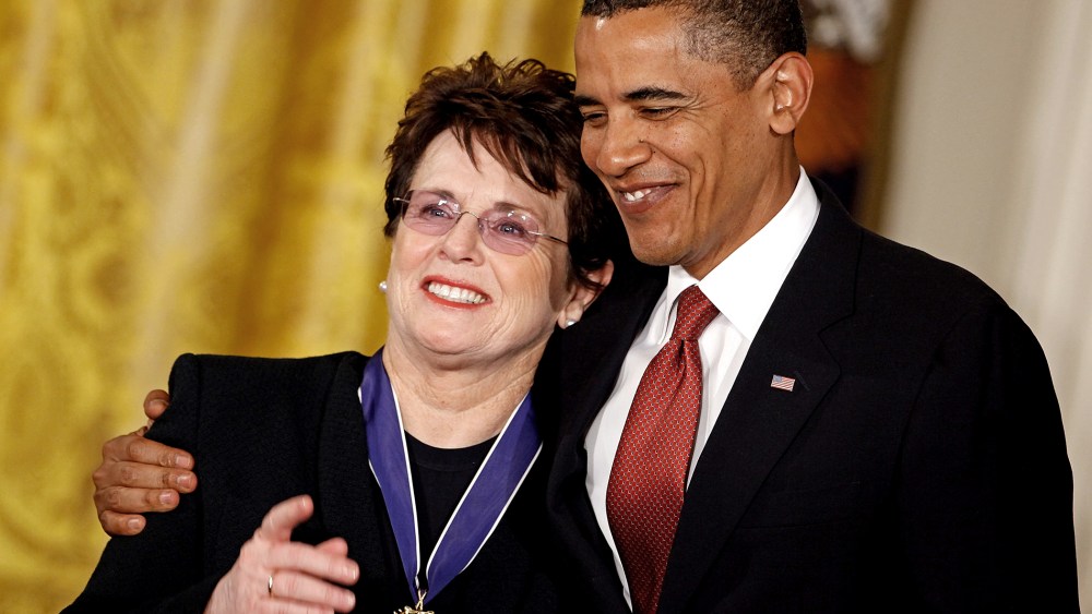 President Barack Obama embraces tennis icon Billie Jean King after presenting her with the Medal of Freedom at the White House on Aug. 12, 2009 in Washington, DC.