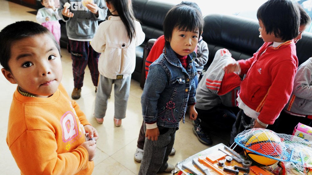 A group of 60 children are waiting to reunite with their parents after police rescued them from human traffickers at Guiyang Welfare Center for Children in Guiyang, southwest China's Guizhou province on October 29, 2009.