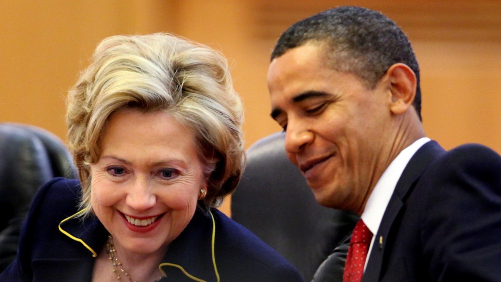 File Photo:  U.S. President Barack Obama (R) chats with U.S. Secretary of State Hillary Rodham Clinton (L) during a bilateral meeting with Chinese President Hu Jintao at the Great Hall of the People on November 17, 2009 in Beijing, China.  (Photo by...