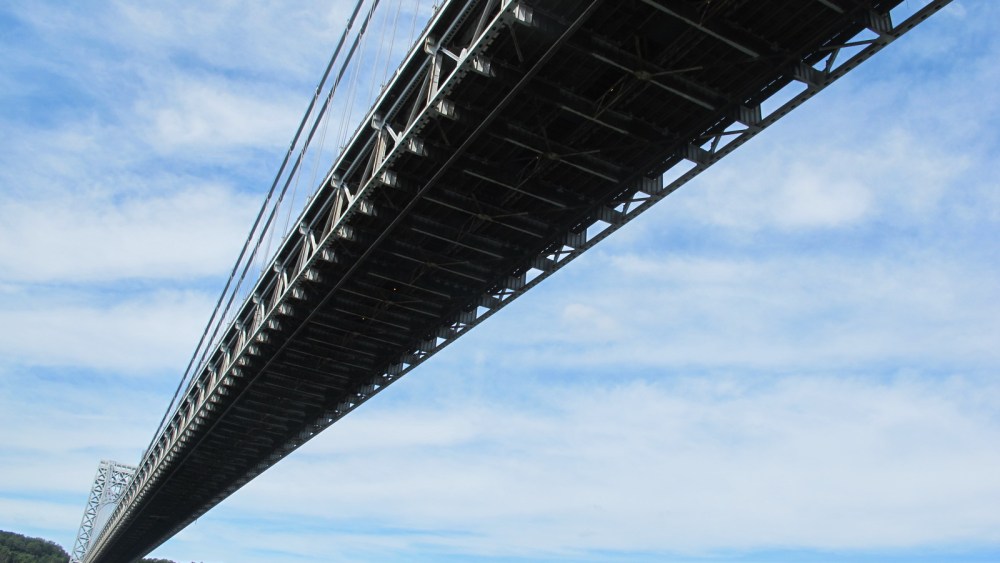 Passing under the George Washington Bridge on the Hudson River, September 5, 2013.