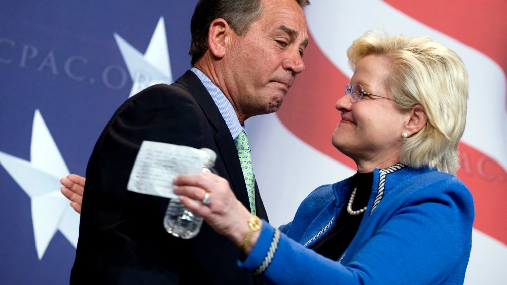 Cleta Mitchell of American Conservative Union, hugs House Minority Leader John Boehner, R-Ohio, before he addressed the Conservative Political Action Conference (CPAC) held at the Marriott Wardman Park hotel, Feb. 18, 2010.