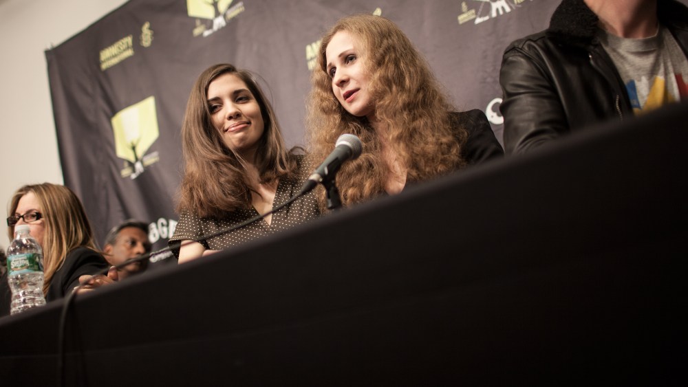 Nadezhda Tolokonnikova (L) and Maria Alyokhina (R), members of the Russian punk group Pussy Riot, at a press conference in Brooklyn, N.Y. on Feb. 5, 2014.