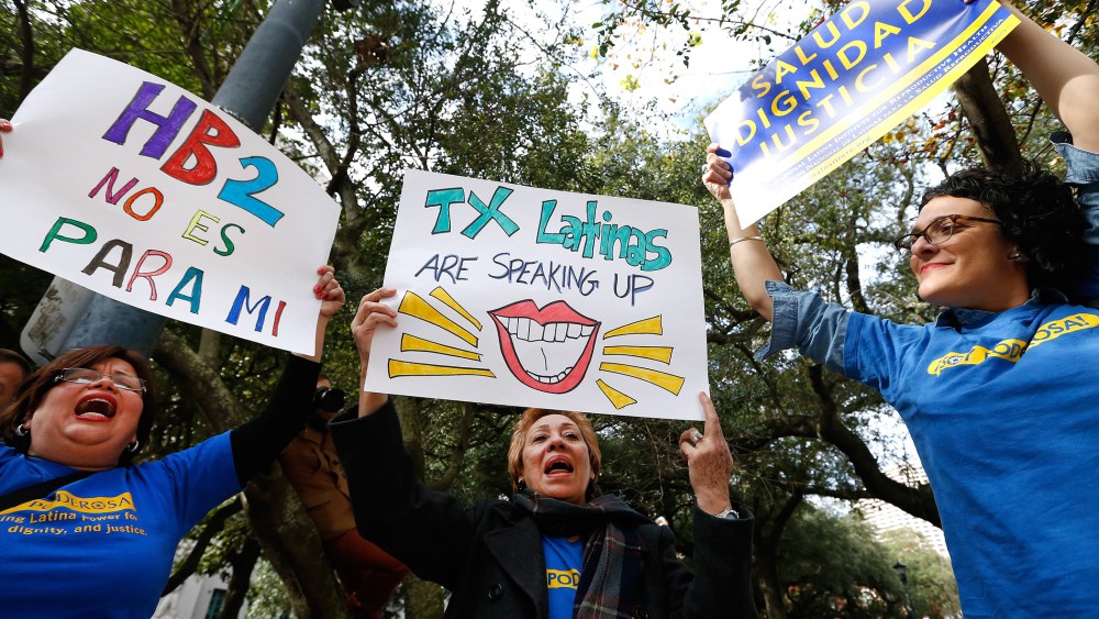 Celeste Mariuex, center, of Texas, demonstrates outside of the 5th U.S. Circuit Court of Appeals, on Jan. 7, 2015, in New Orleans.