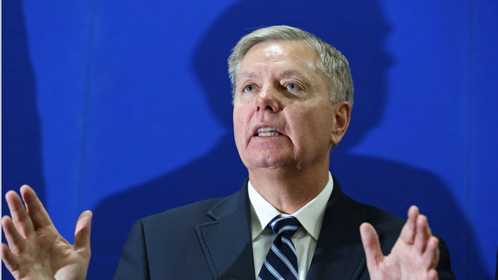Sen. Lindsey Graham addresses a press conference at the U.S. Embassy in Kabul, Afghanistan, Thursday, Jan. 2, 2014.