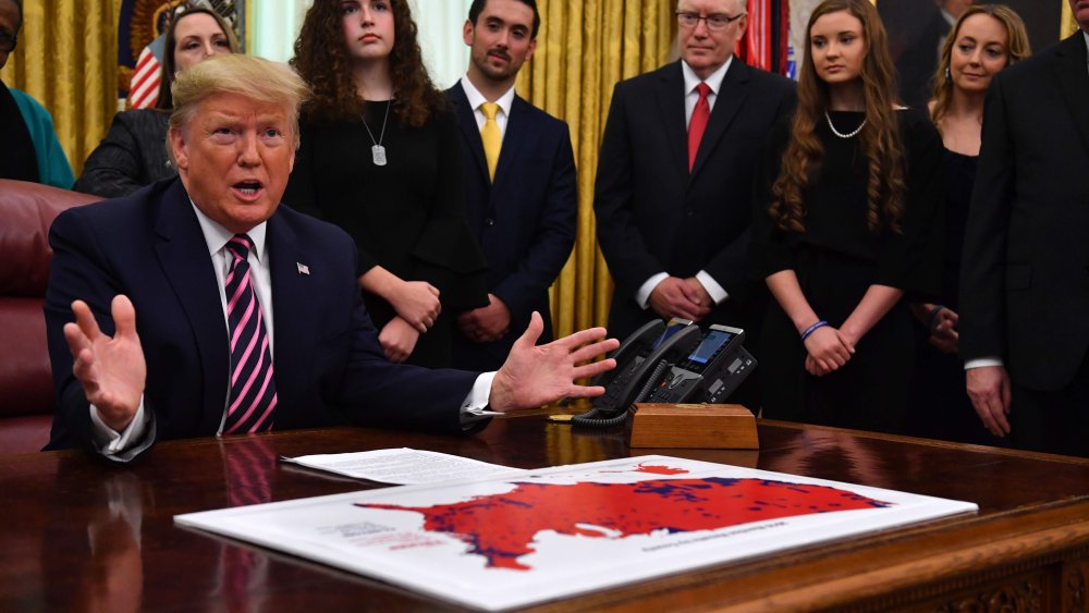 US President Donald Trump gestures as he speaks during the Announcement of the Guidance on Constitutional Prayer in Public Schools, at the White House in Washington, DC, on January 16, 2020.