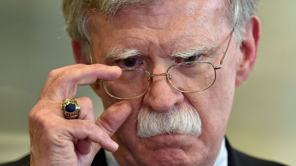 In this file photo taken on August 29, 2019 US National Security Advisor John Bolton answers journalists questions after his meeting with Belarus President in Minsk.