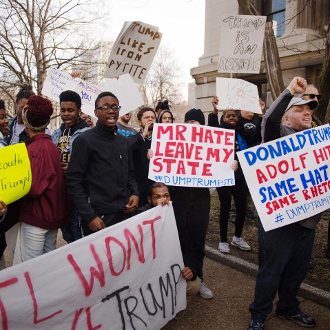 People protest before Republican Presidential candidate Donald Trump's rally outside the Peabody Opera House on March 11, 2016 in St. Louis, Mo. (Photo by Michael B. Thomas/AFP/Getty)