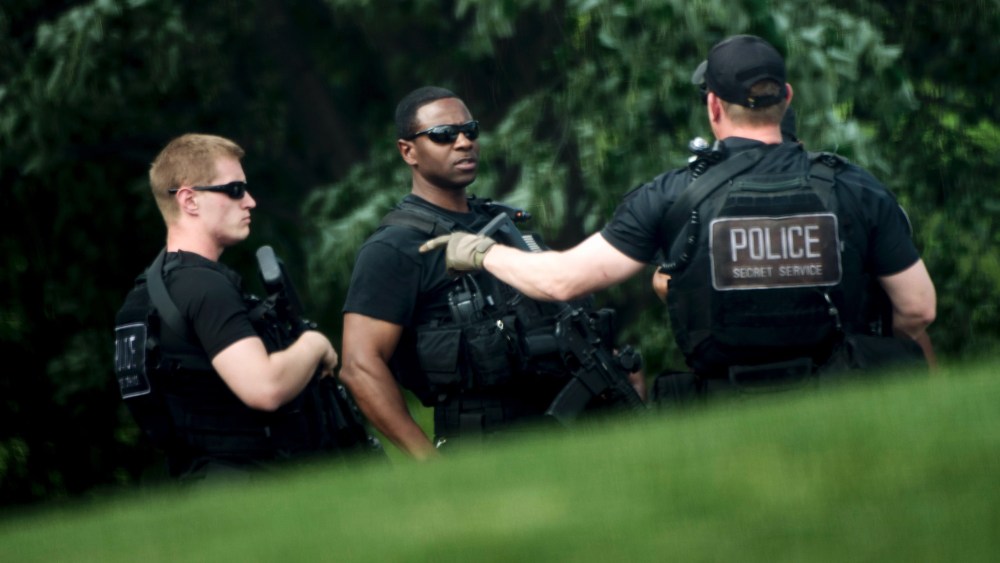 Heavily armed members of the Secret Service patrol on the North Lawn of the White House during a security lockdown April 26, 2016 in Washington, DC. (Photo by Brendan Smialowski/AFP/Getty)
