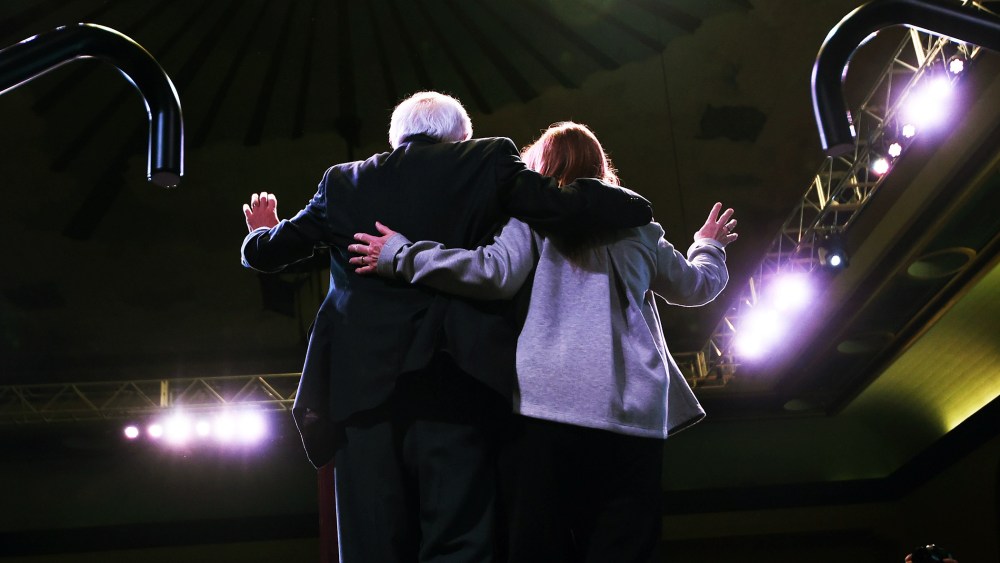 Democratic presidential candidate Bernie Sanders and his wife Jane Sanders wave during a rally in Atlantic City, New Jersey, on May 9, 2016. (Photo by Jewel Samad/AFP/Getty)