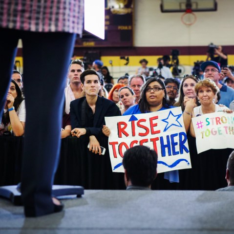 Supporters listen as Democratic presidential candidate Hillary Clinton speaks during a campaign rally at Sacramento City College on June 5, 2016 in Sacramento, Calif. (Photo by Gabrielle Lurie/AFP/Getty)