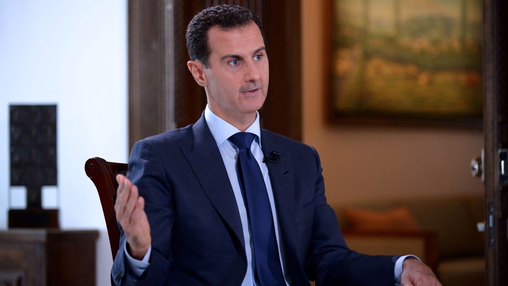 A handout picture released by the official Syrian Arab News Agency (SANA) on July 14, 2016 shows Syrian President Bashar al-Assad speaking during an interview with NBC News in the capital Damascus. (Photo by SANA/Handout/AFP/Getty)