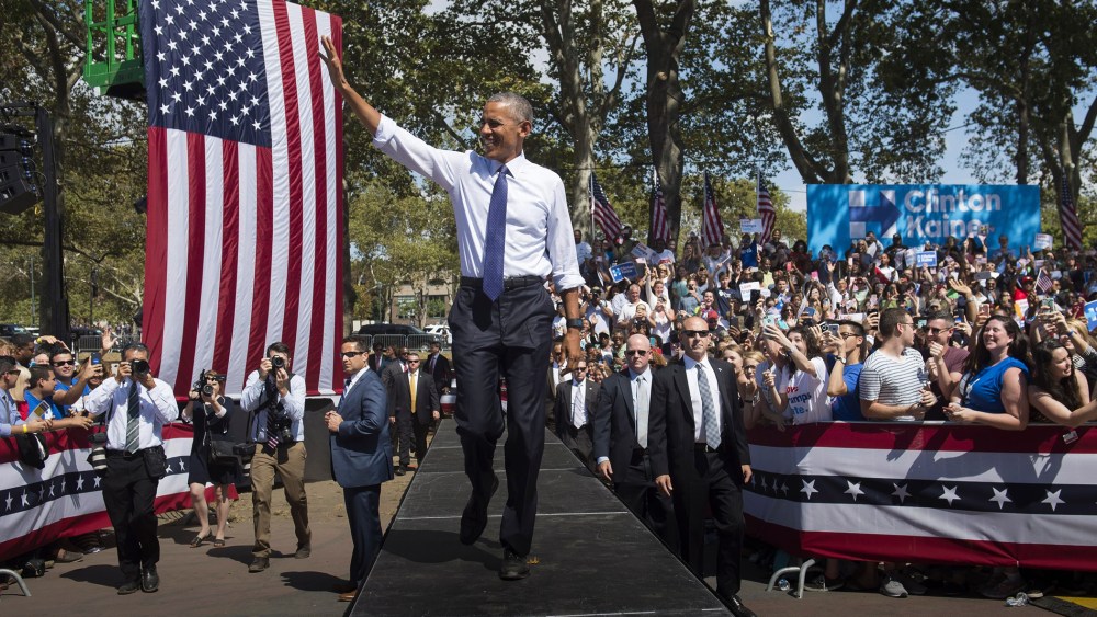 President Barack Obama arrives for a rally for Democratic presidential nominee Hillary Clinton at Eakins Oval in Philadelphia, Penn. on Sept. 13, 2016. (Photo by Saul Loeb/AFP/Getty)