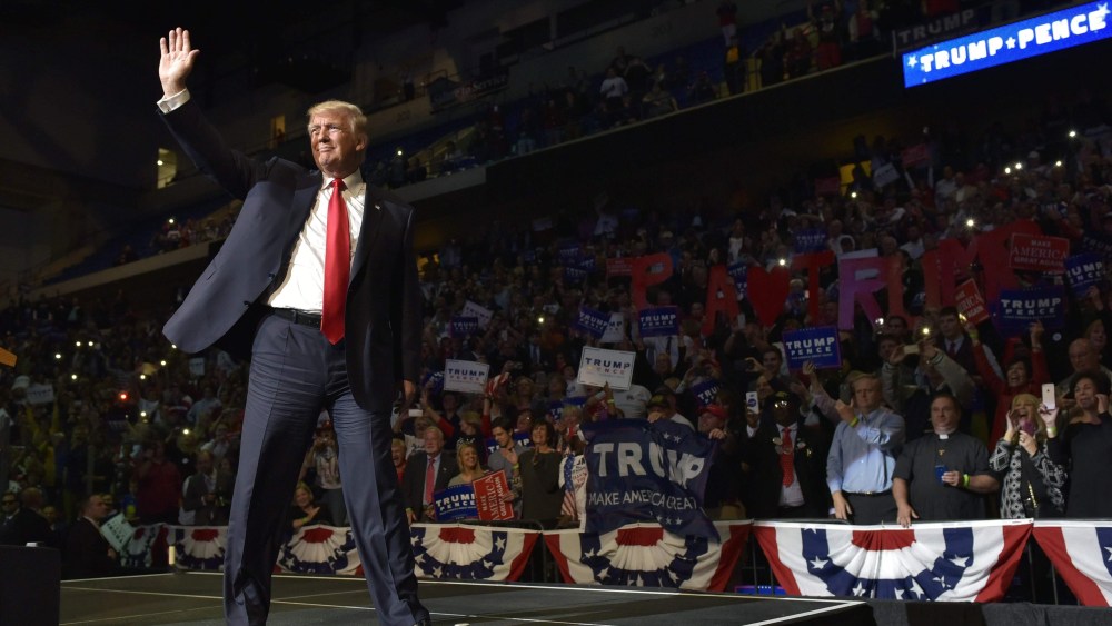 Republican presidential nominee Donald Trump arrives on stage for a rally at Mohegan Sun Arena, Oct. 10, 2016, in Wilkes-Barre, Pa. (Photo by Mandel Ngan/AFP/Getty)