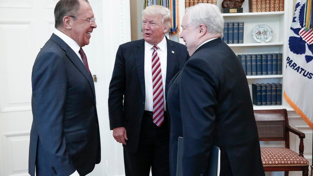 This file handout photo taken on May 10, 2017 made available by the Russian Foreign Ministry shows shows US President Donald J. Trump (C) speaking with Russian Foreign Minister Sergei Lavrov (L) and Russian Ambassador to the US, Sergei Kislyak.