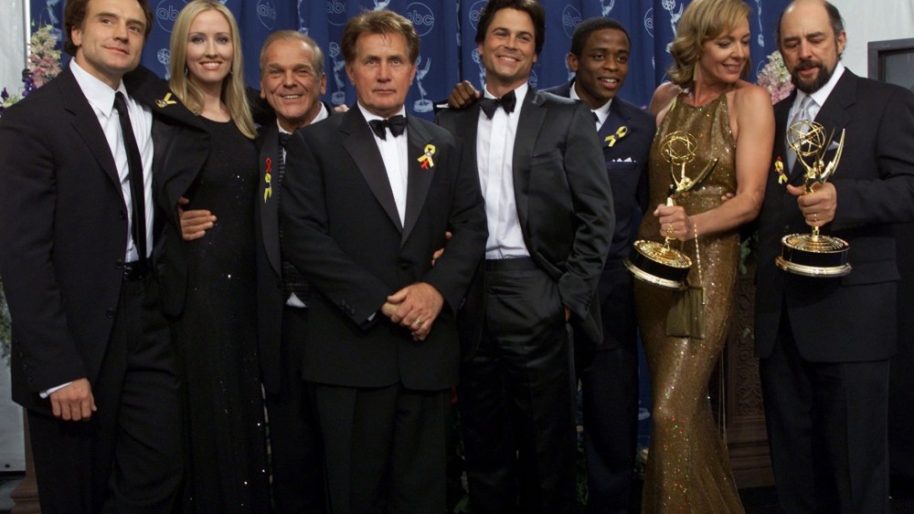 The cast of "The West Wing" pose for photographers at the 52nd Annual Primetime Emmy Awards in Los Angeles, Sept. 10, 2000. (Photo by Kevork Djansezian/AP)