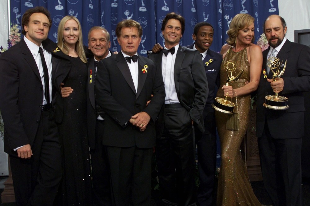 The cast of "The West Wing" pose for photographers at the 52nd Annual Primetime Emmy Awards in Los Angeles, Sept. 10, 2000. (Photo by Kevork Djansezian/AP)