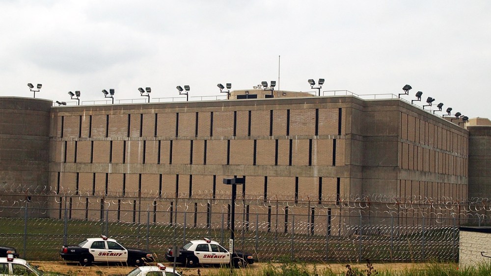 Sheriff's department cars are parked near the Suffolk County Correctional Facility in Riverhead, N.Y.