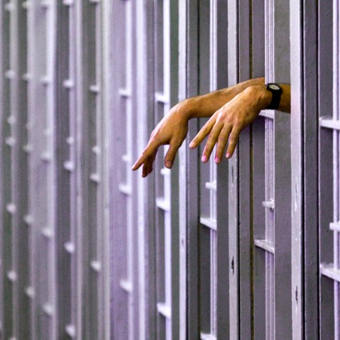 An unidentified death row inmate in his cell in the North Condemned Unit at Pontiac Correctional Institution in Pontiac, Ill. (Photo by Seth Perlman/AP)
