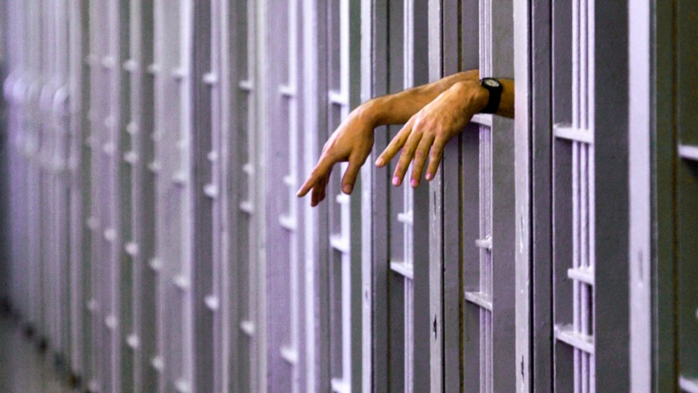 An unidentified death row inmate in his cell in the North Condemned Unit at Pontiac Correctional Institution in Pontiac, Ill. (Photo by Seth Perlman/AP)