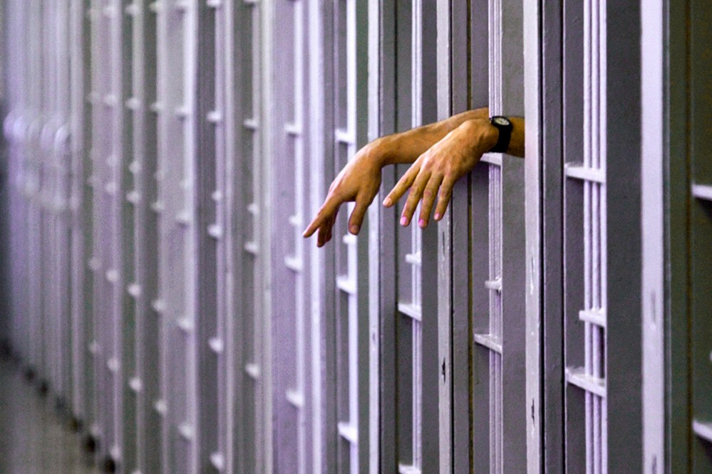 An unidentified death row inmate in his cell in the North Condemned Unit at Pontiac Correctional Institution in Pontiac, Ill. (Photo by Seth Perlman/AP)