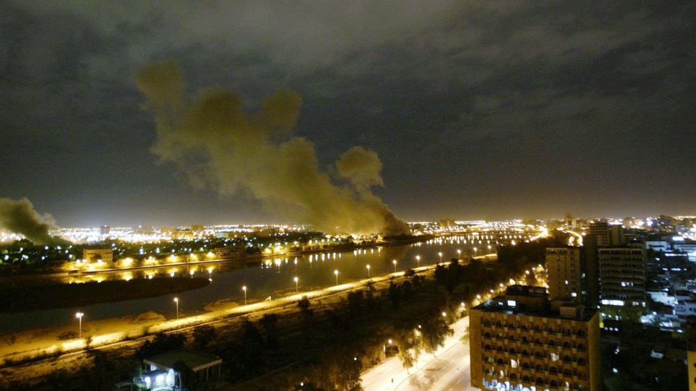 Smoke rises from the Trade Ministry in Baghdad on March 20, 2003 after it was hit by a missile during the US-led forces attack, marking the start of the invasion of Iraq.