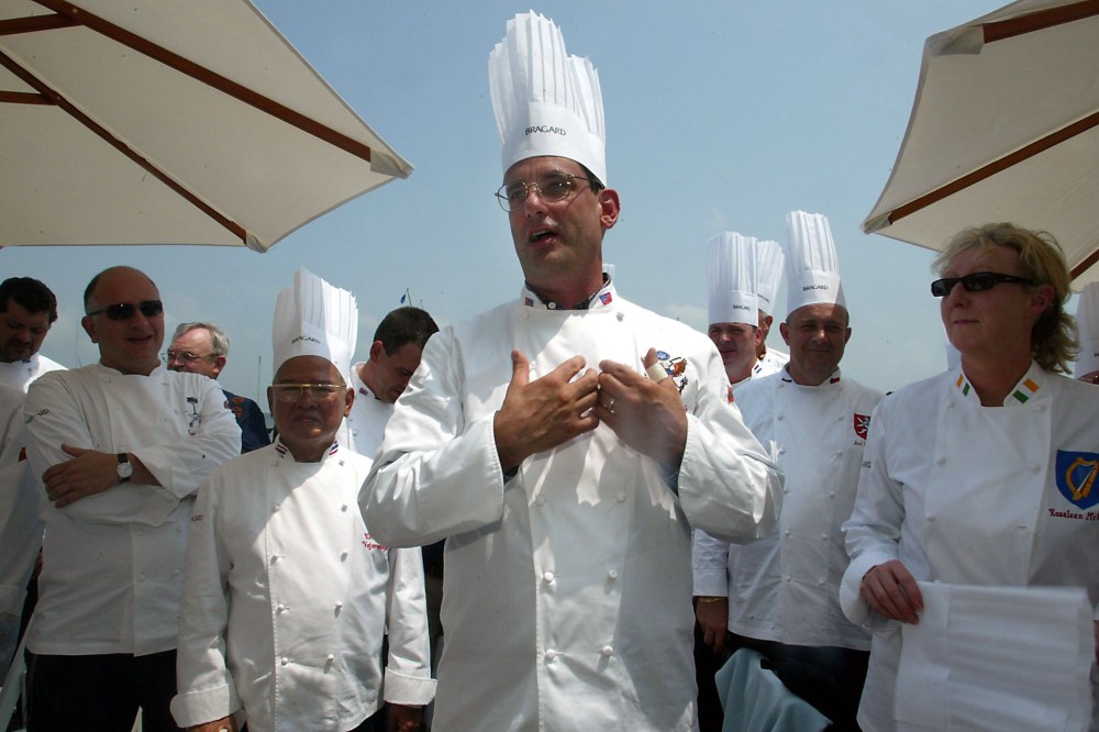 Chef to president George W. Bush , Walter Scheib, greets chefs from around the world at the Chesapeake Bay Maritime Museum in St. Michaels, Md., July 27, 2004. (Photo by Matt Houston/AP)