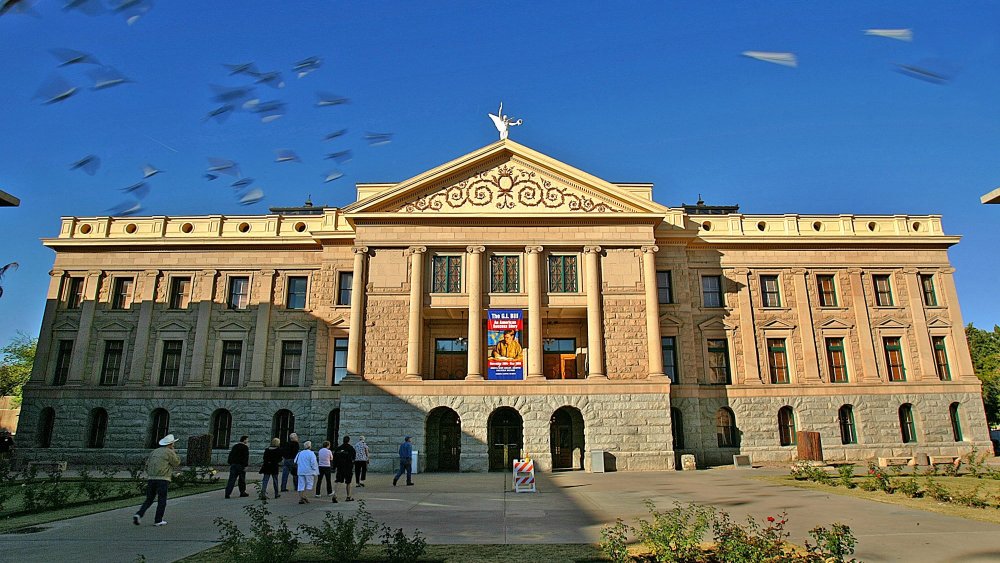 Citizens tour the Arizona Capitol grounds in Phoenix in this Dec. 14, 2004 file photo.