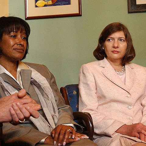 Judicial nominees Janice Rogers Brown, center, and Priscilla Owen pose for pictures on Capitol Hill Tuesday, May 17, 2005.