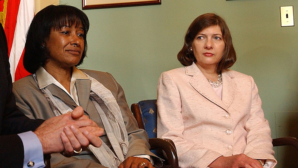 Judicial nominees Janice Rogers Brown, center, and Priscilla Owen pose for pictures on Capitol Hill Tuesday, May 17, 2005.