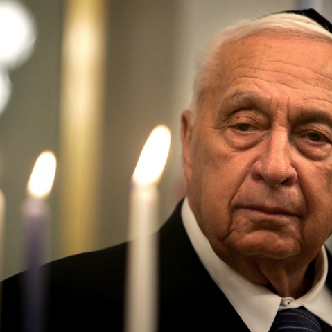 Israeli Prime Minister Ariel Sharon is seen as he takes part in the lighting of a Hanukkah candle at his Jerusalem office, Dec. 27, 2005.