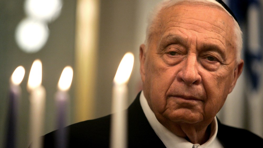 Israeli Prime Minister Ariel Sharon is seen as he takes part in the lighting of a Hanukkah candle at his Jerusalem office, Dec. 27, 2005.