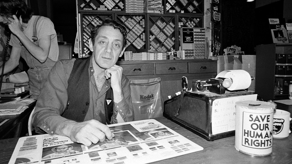 Harvey Milk, a gay political leader in San Francisco, is seen pictured in his camera store on Castro Street on June 28, 1977 in San Francisco. (Photo by STF/AP)