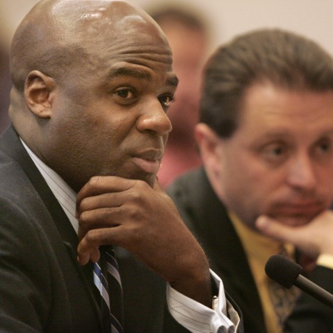 Nevada Assemblyman Kelvin Atkinson, D-North Las Vegas, left, listens during a joint transportation hearing Friday, June 1, 2007, at the Legislature in Carson City, Nev. (AP Photo/The Nevada Appeal, Cathleen Allison)