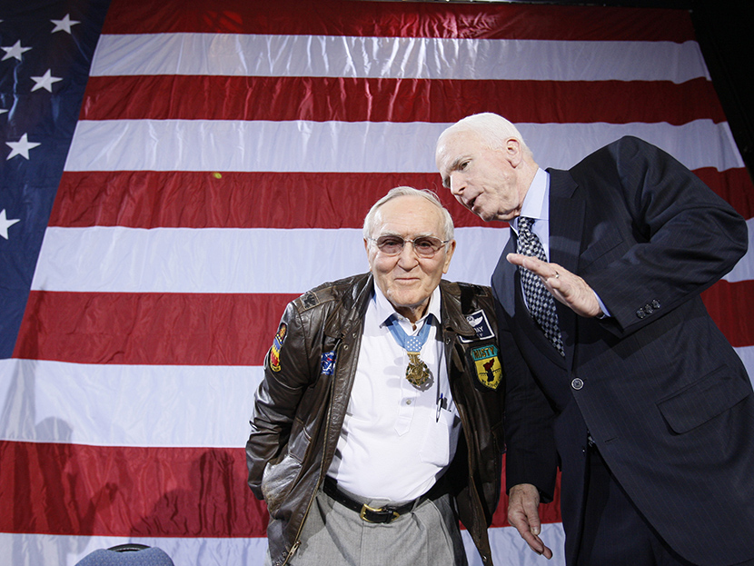 Retired U.S. Air Force Col. Bud Day, left, who was a prisoner of war in Vietnam with Senator John McCain, during a campaign rally at the Emerald Creek Conference Center in Ft. Walton Beach, Fla., Tuesday, Jan. 22, 2008. (Photo by Charles Dharapak/AP)