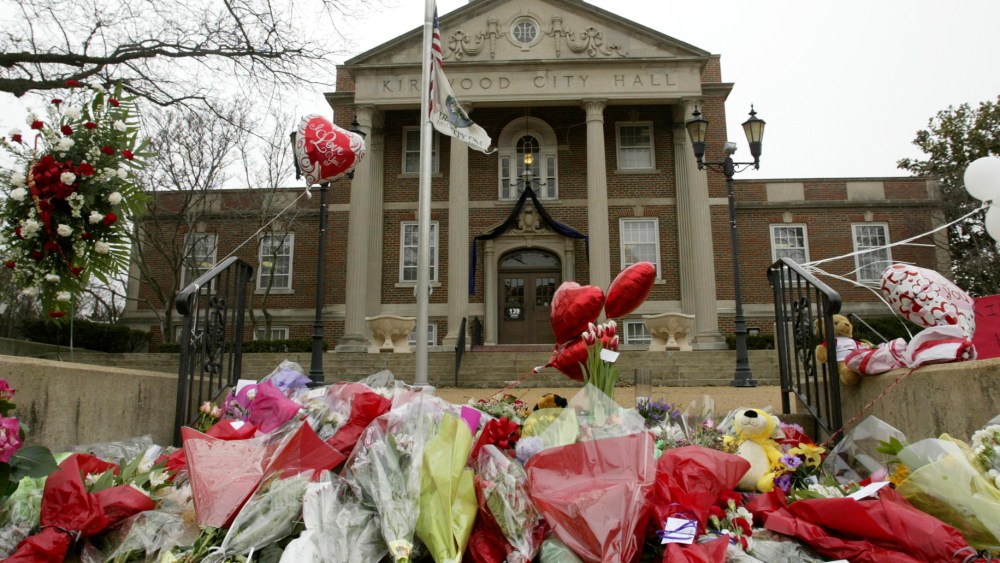 In this Feb. 8, 2008 file photo, a memorial for those killed in a shooting rampage is seen outside City Hall where a gunman opened fired the day before in Kirkwood, Mo.