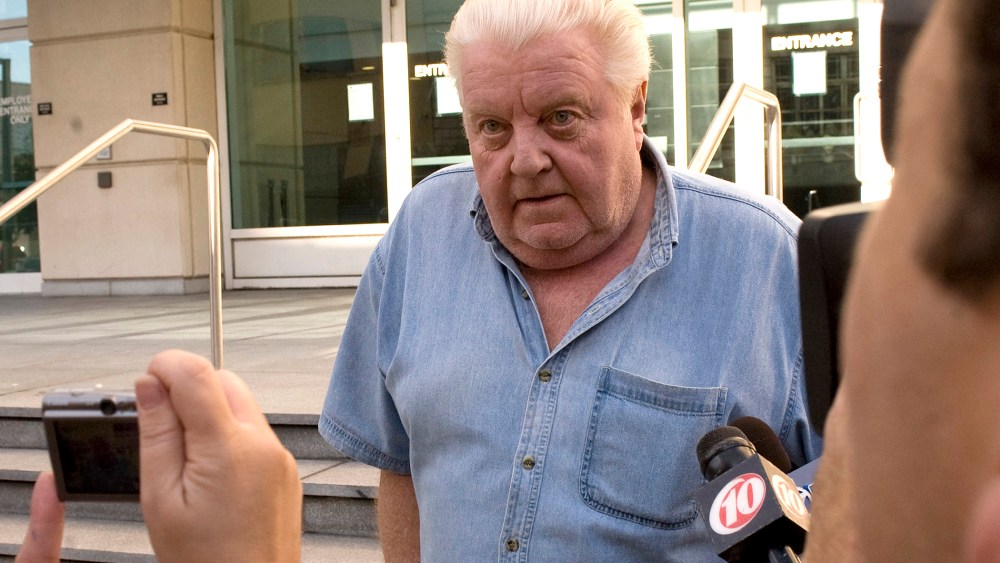 Former Chicago Police Department commander Jon Burge walks by reporters outside the Federal Courthouse after he was released from custody Tuesday afternoon, Oct. 21, 2008 in Tampa, Fla. (Photo by Steve Nesius/AP)