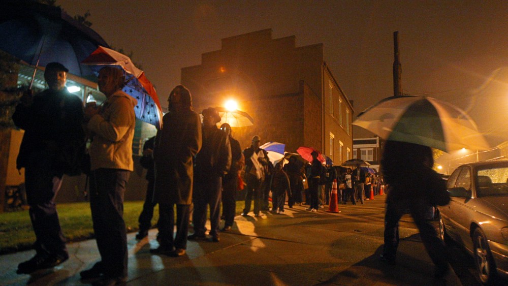 File photo: Voters line up before 6 a.m. outside the City Hall East voting precinct in Richmond, Va., on Tuesday, November 4, 2008. (Eva Russo)